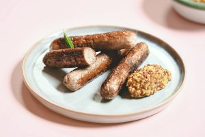 De eerste kweekvleesproducten die Meatable afgelopen zomer presenteerde: worstjes van kweekvlees.